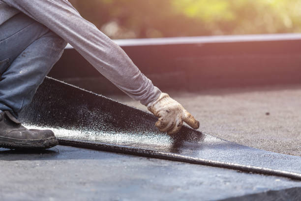 Professional Waterproofing technician working in Spring Lake, MI
